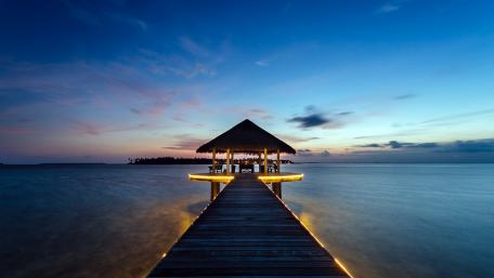 Tropical Pier at Dusk Illuminated by Serenity wallpaper