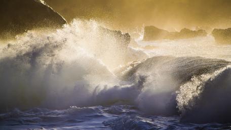 Stormy Waves Crashing Beautifully at Dusk wallpaper