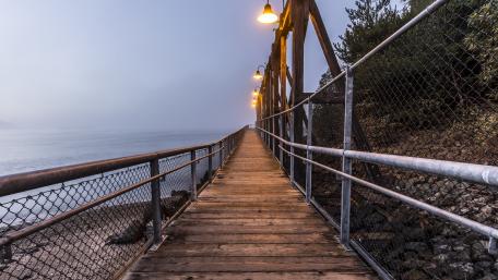 Serene Walkway Along the Shoreline wallpaper