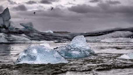 Majestic Arctic Ice Formation in Tranquil Waters wallpaper