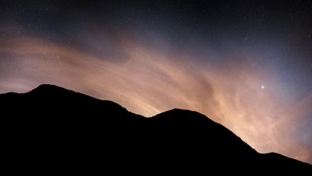 Majestic Mountains Under the Starry Sky wallpaper