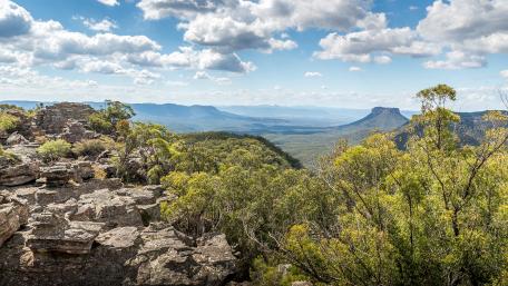 Scenic Mountain Vista Under a Cloudy Sky wallpaper