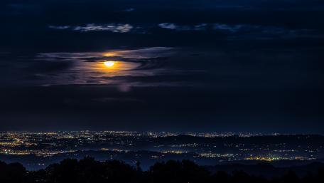 Moonlit Skyline Overlooking a Sleeping City wallpaper