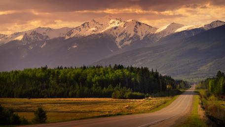 Majestic Mountain Road at Sunset wallpaper