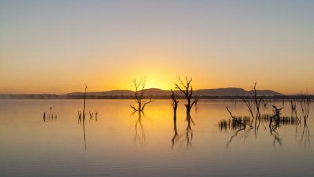 Serene Sunset Over Tranquil Waters wallpaper
