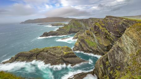 Majestic Coastal Cliffs and Turquoise Waves Wholeheartedly Embrace Nature's Beauty wallpaper