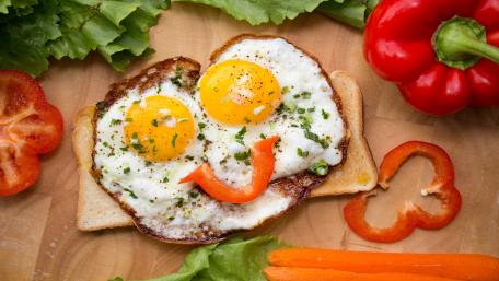 Joyful Breakfast Smiley with Fried Eggs and Veggies wallpaper