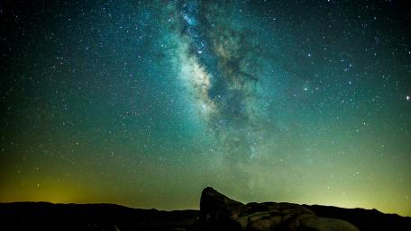 Milky Way Over Serene Landscape wallpaper