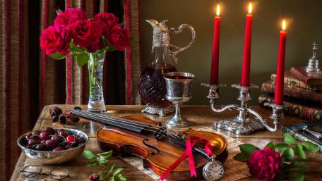Elegant Violin Amidst Candlelight and Roses wallpaper