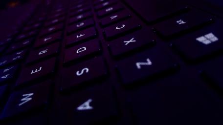 Elegant Black Keyboard Close-Up Wallpaper wallpaper