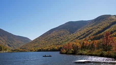 Serene Autumn Landscape Overlooking a Calm Lake wallpaper