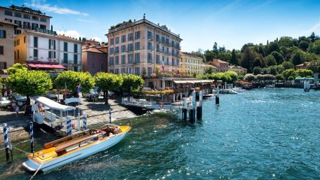 Charming Lakeside Village Scene wallpaper