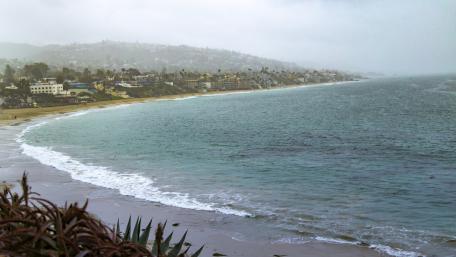 Coastal Serenity in a Misty Landscape wallpaper
