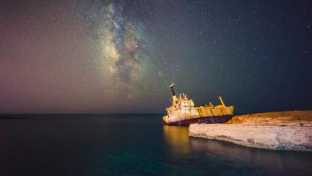 Lost Ship Under the Milky Way Sky wallpaper