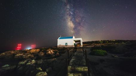 Majestic Milky Way Over Tranquil Landscape wallpaper
