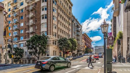 Vibrant Downtown City Scene with Dynamic Streetscape wallpaper