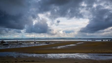 Cloudy Shoreline at Low Tide wallpaper