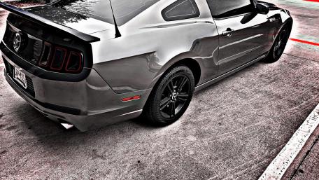Sleek Black and White Muscle Car Wallpaper wallpaper