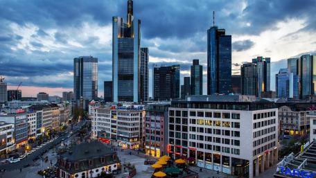 Modern Cityscape Under Dramatic Skies wallpaper