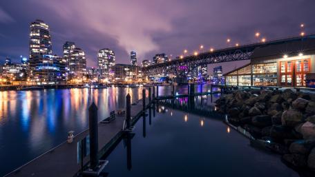 Nighttime Serenity Over a Vibrant Cityscape wallpaper
