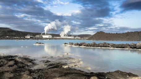 Majestic Geothermal Landscape with Tranquil Waters wallpaper