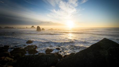 Morning Serenity at the Rocky Shoreline wallpaper