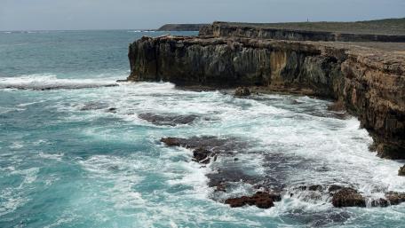 Majestic Seaside Cliffs and Ocean Waves wallpaper