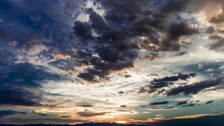 Vibrant Sunset Over Dynamic Cloudscape wallpaper