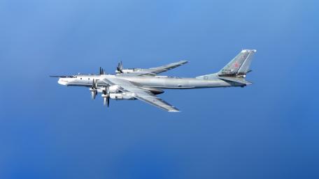 Majestic Military Aviation in Clear Skies wallpaper