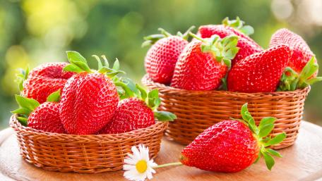 Fresh Strawberry Delight in a Wicker Basket wallpaper