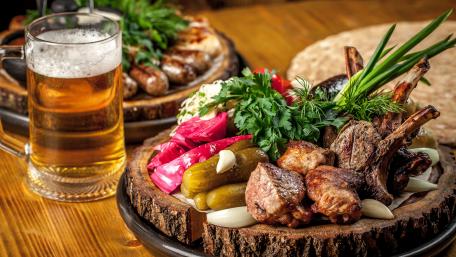 Savor the Feast of Roast Meat and Beer wallpaper