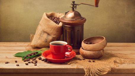 Warm Coffee Vibes with Beans and Vintage Grinder wallpaper