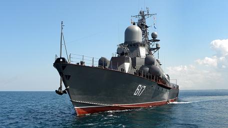 Mighty Warship Sailing the Open Sea wallpaper