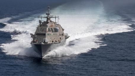 Powerful Navy Ship in Action at Sea wallpaper