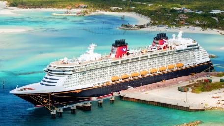 Majestic Cruise Ship in Crystal Clear Waters wallpaper