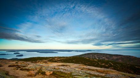 Serene Horizon Over Rugged Coastal Landscape wallpaper