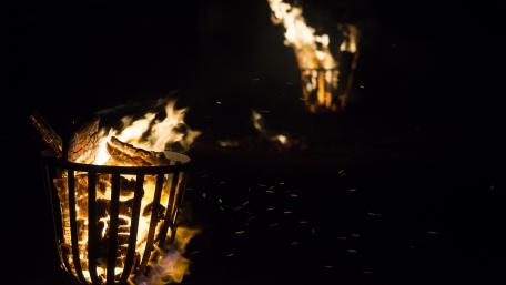 Fiery Ember Dance in Darkness wallpaper