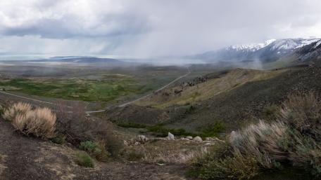Majestic Mountain Landscape Under Stormy Skies wallpaper