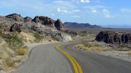 Curvy Road Through Stunning Landscape wallpaper
