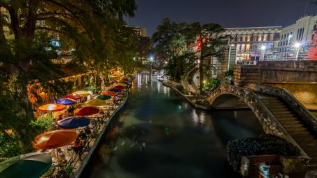 Vibrant Nightlife by the Canal in the City wallpaper