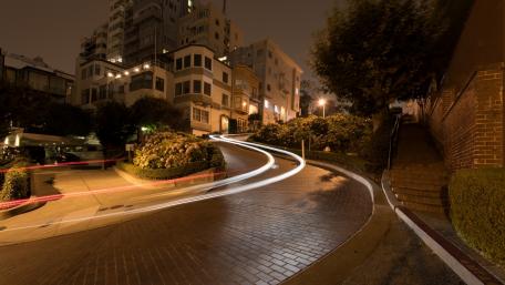 Curving City Lights at Night wallpaper