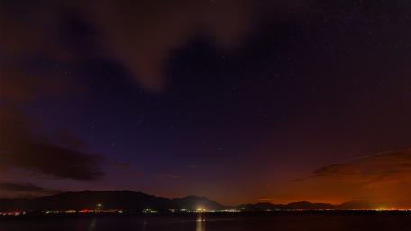 Serenity in the City Night Sky wallpaper
