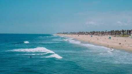 Tranquil Waves and Sandy Shores wallpaper
