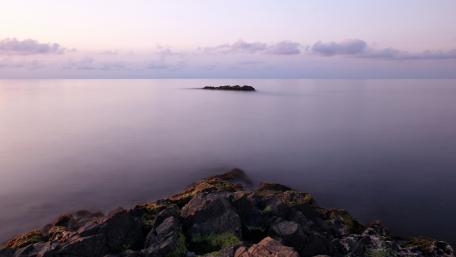 Serene Sunset Over Calm Waters wallpaper