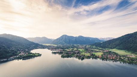 Serene Landscape Overlooking Mountains and Lake wallpaper