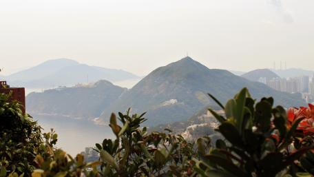 Serene Mountain Vista Overlooking Tranquil Waters wallpaper