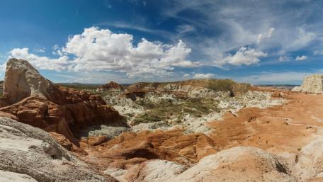 Majestic Desert Landscape Under a Bright Blue Sky wallpaper