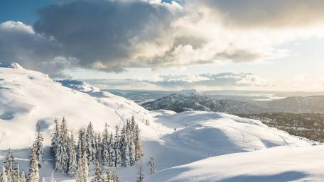 Winter Wonderland Scenic View of Snow-Covered Mountains wallpaper