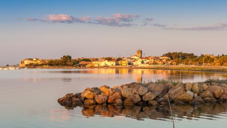 Serene Coastal Village at Sunset wallpaper