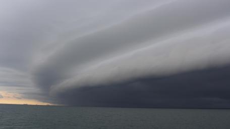 Low Cloud Formations off the Coast of Kintap, Indonesia wallpaper